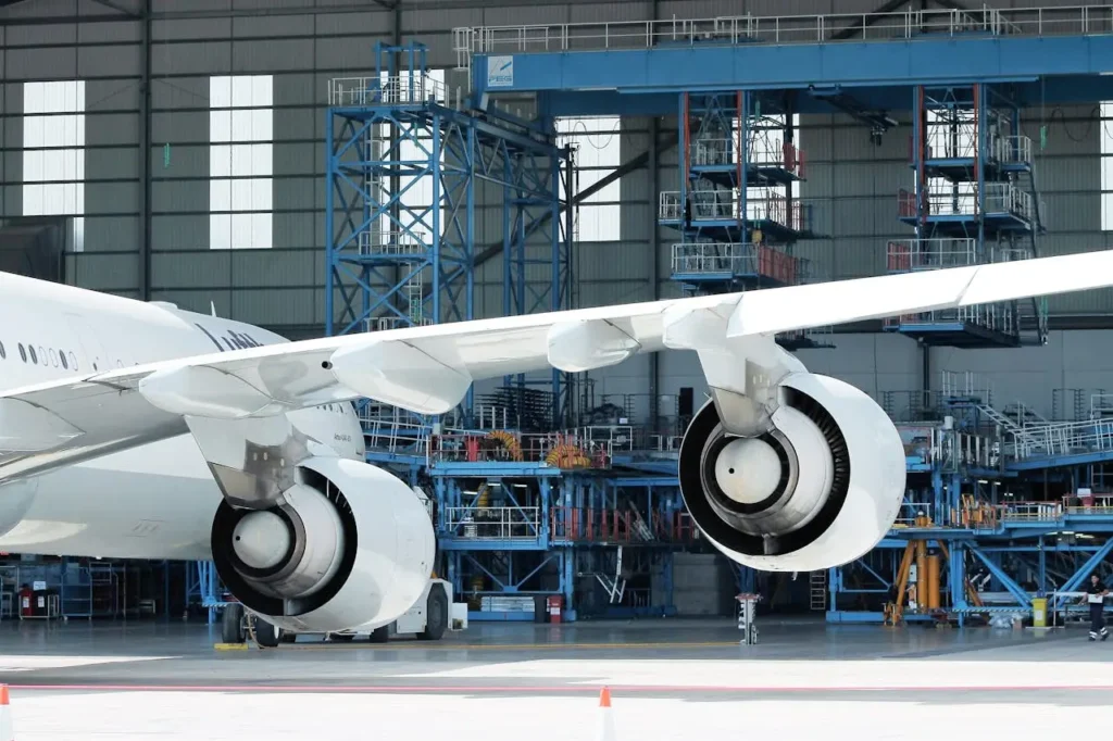 a photo of an airplane in in a terminal, signifying the international market