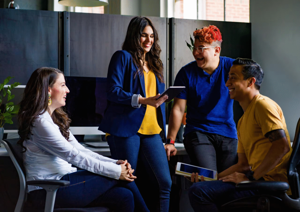 motivated employees engaging in lighthearted conversation