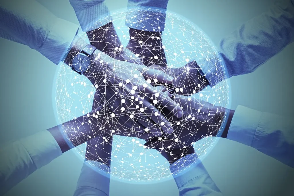 team putting their hands together to symbolize collaborative decision-making