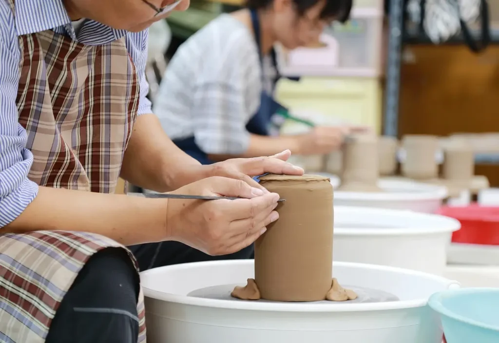 older person learning pottery for personal development